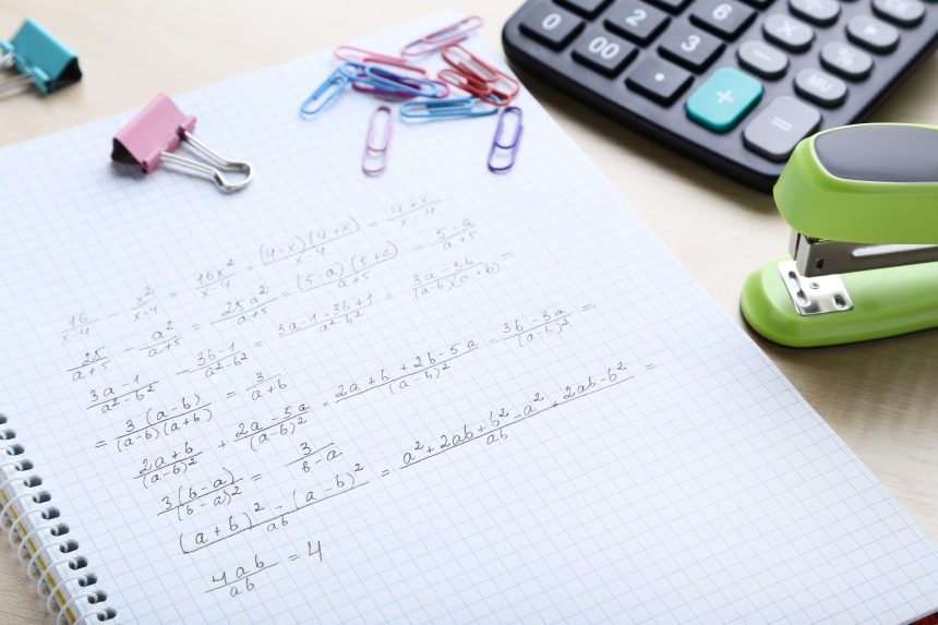 Grade 9 GCSE Maths Student confidently solving complex GCSE Maths problem to achieve Grade 9, GCSE Maths Grade 9